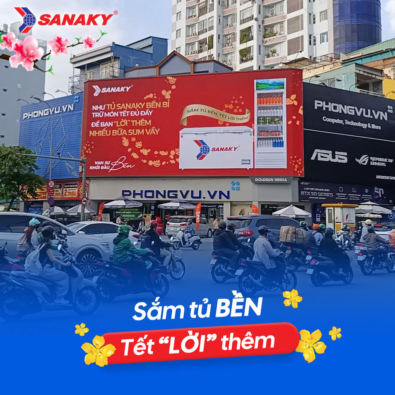 Sanaky Tết campaign billboard on a busy street during the day