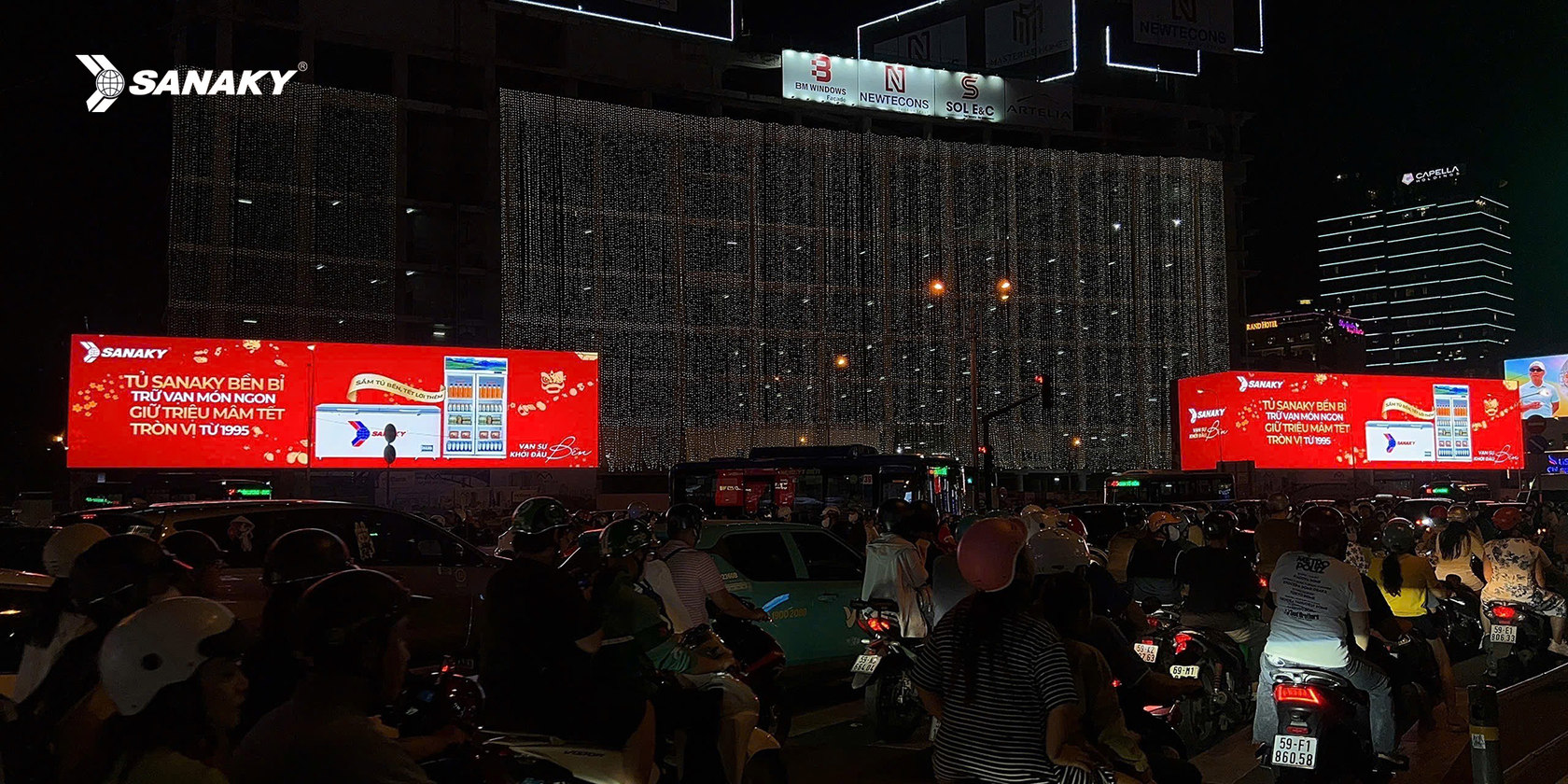 Sanaky Tết campaign across multiple nighttime billboards